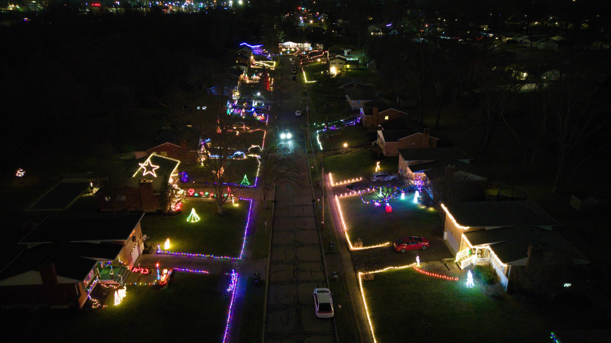 aerial view of Tramore drive with colorful holiday lights outlining all the lots