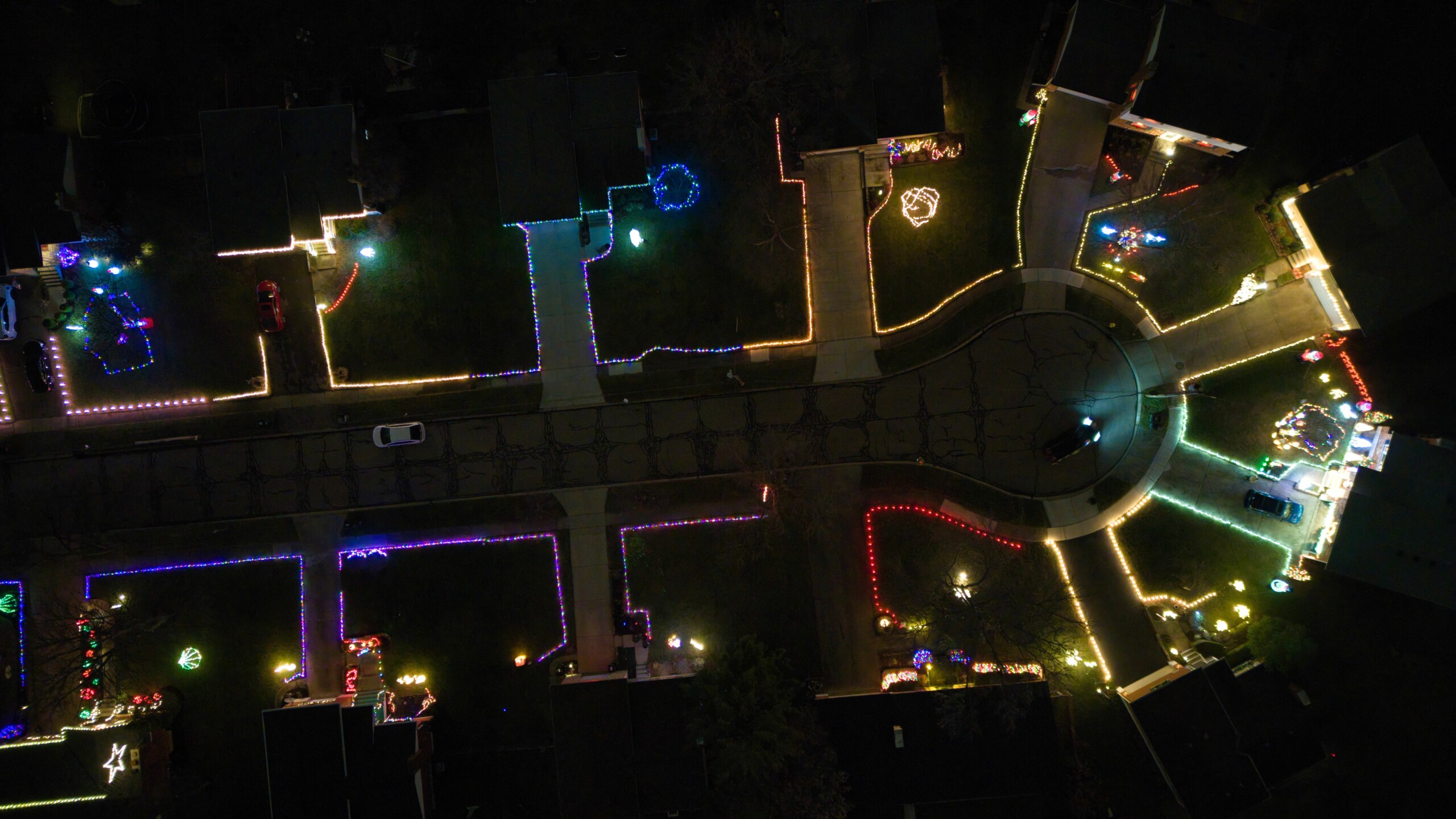 aerial view of Tramore drive with colorful holiday lights outlining all the lots in the cul de sac