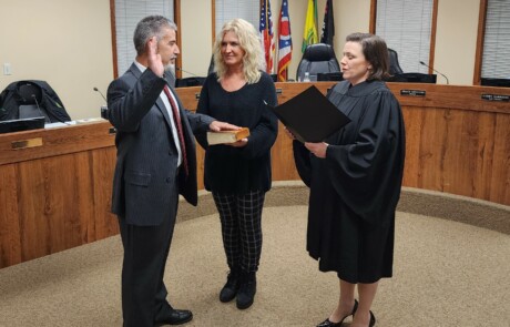 Trustee Tracy Kellums being sworn in by Judge Shanahan