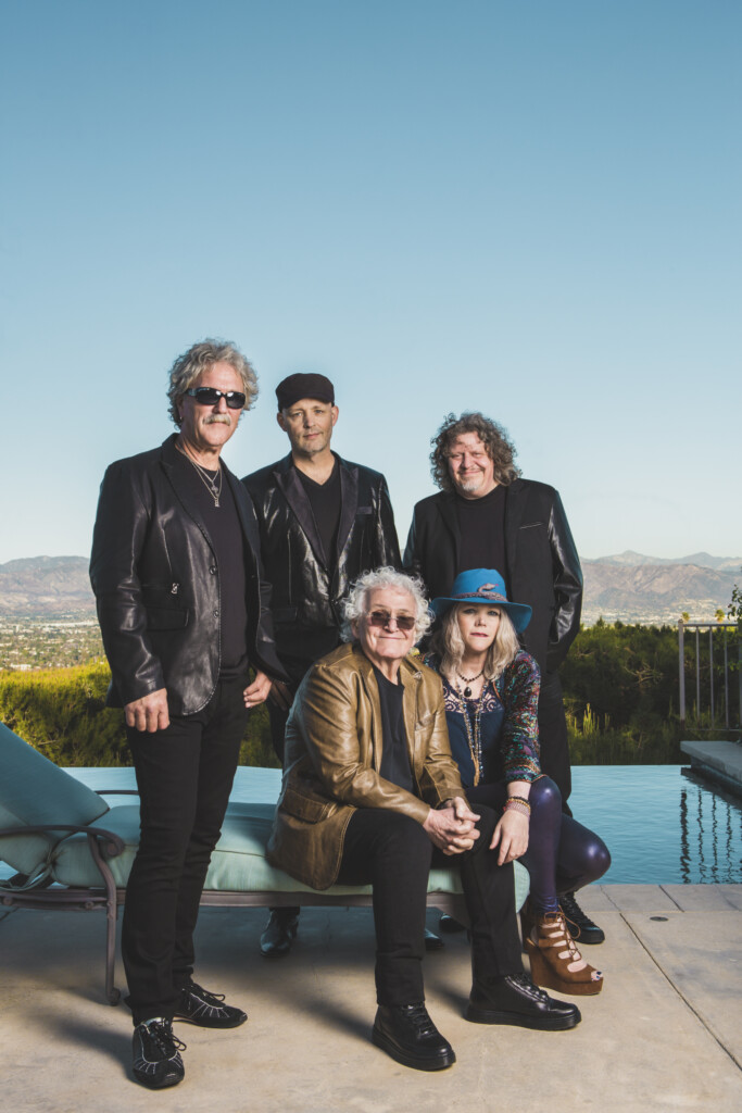 Jefferson Starship band members with blue sky in background